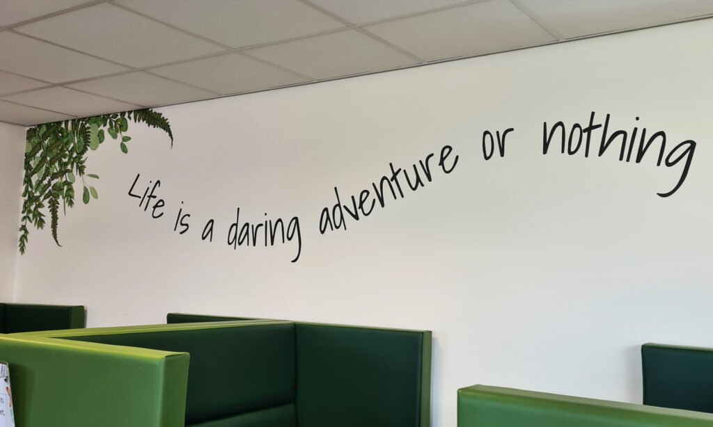 Motivational wall art on school library wall
