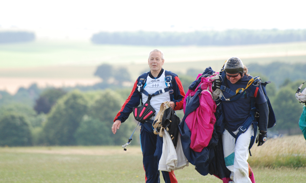 Picture of Colin Horn, Managing Director and founder of Grosvenor Interiors parachuting.